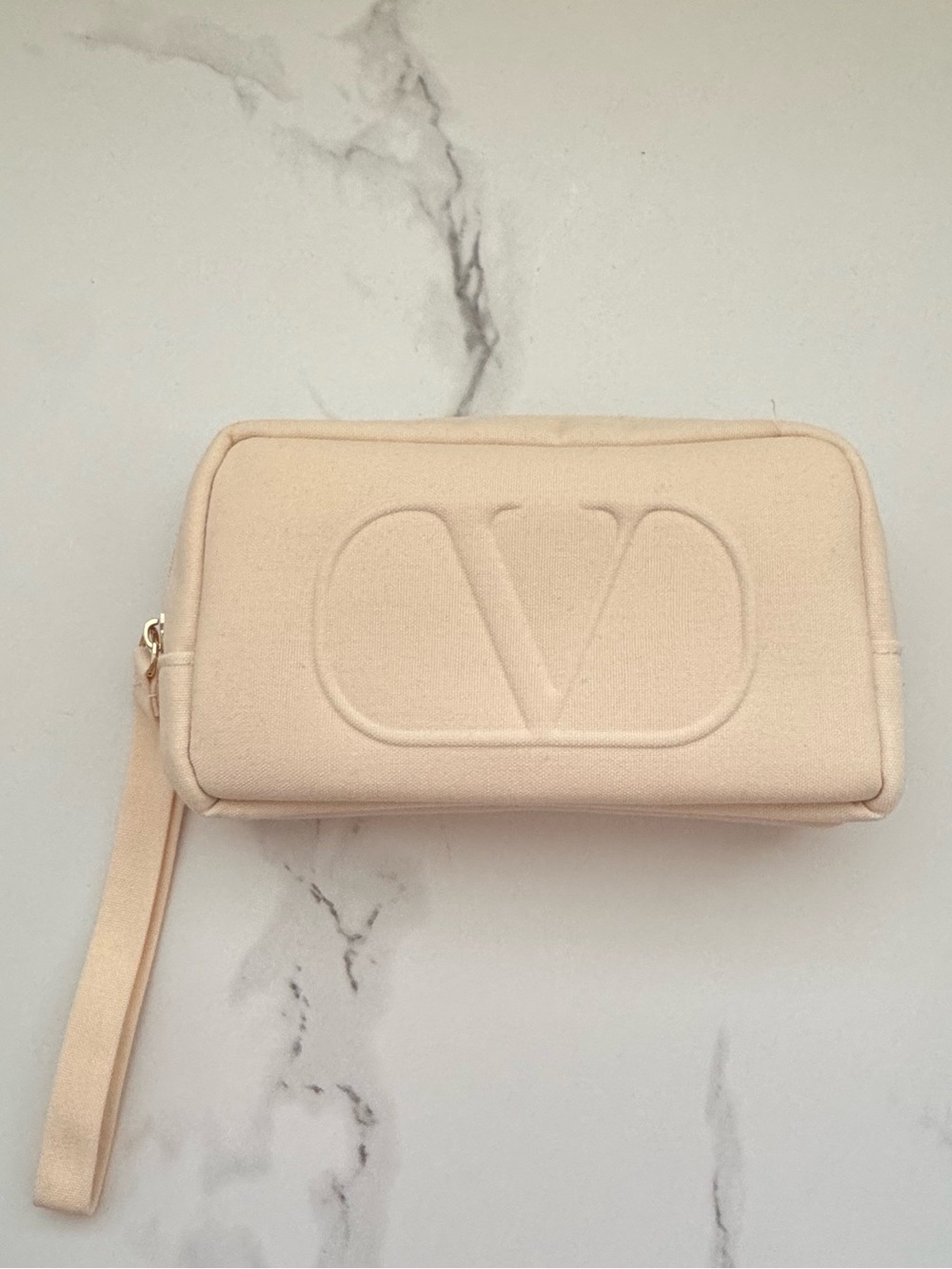 Valentino cream wristlet GWP!